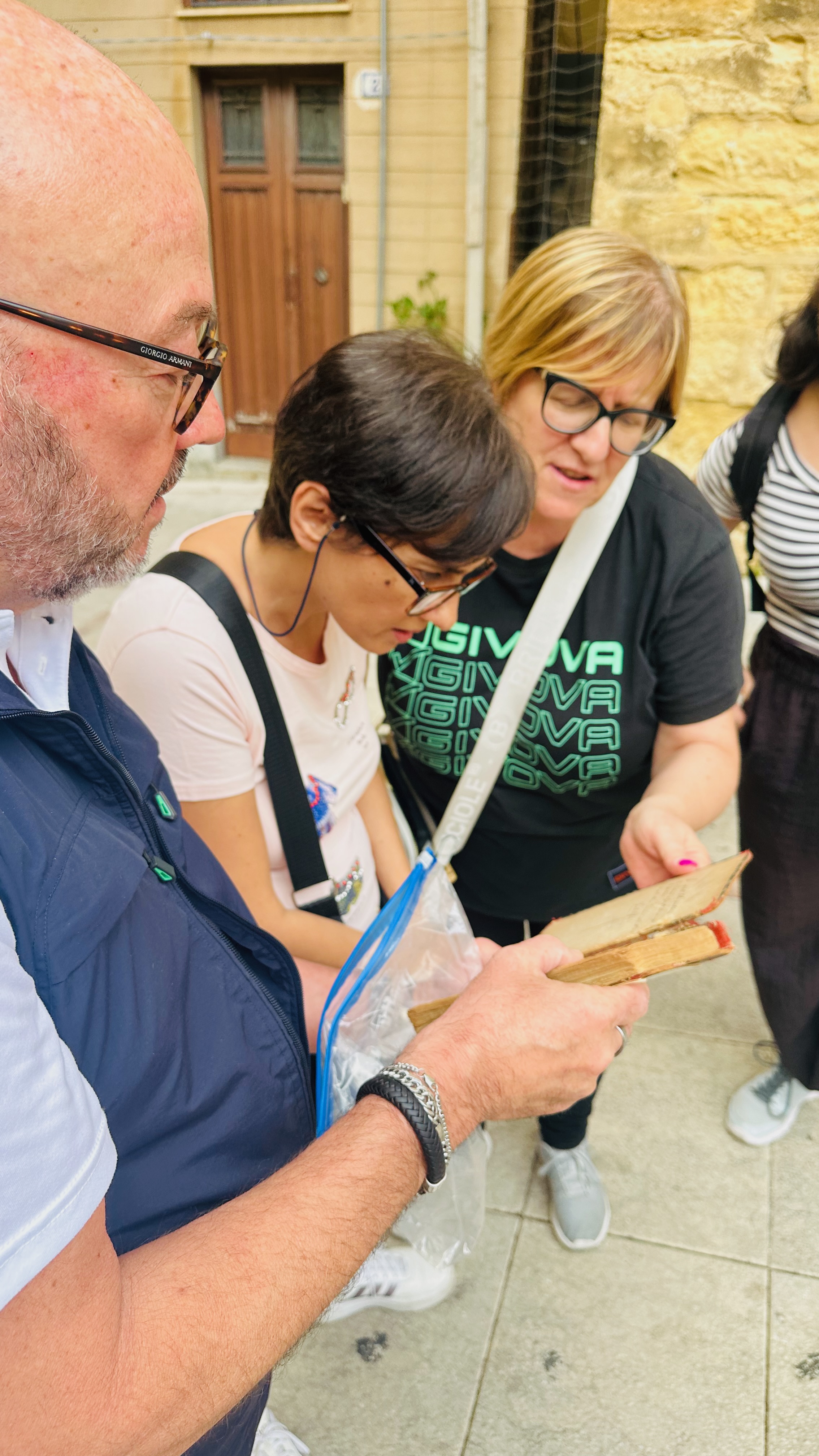 Reviewing historical records during a heritage journey