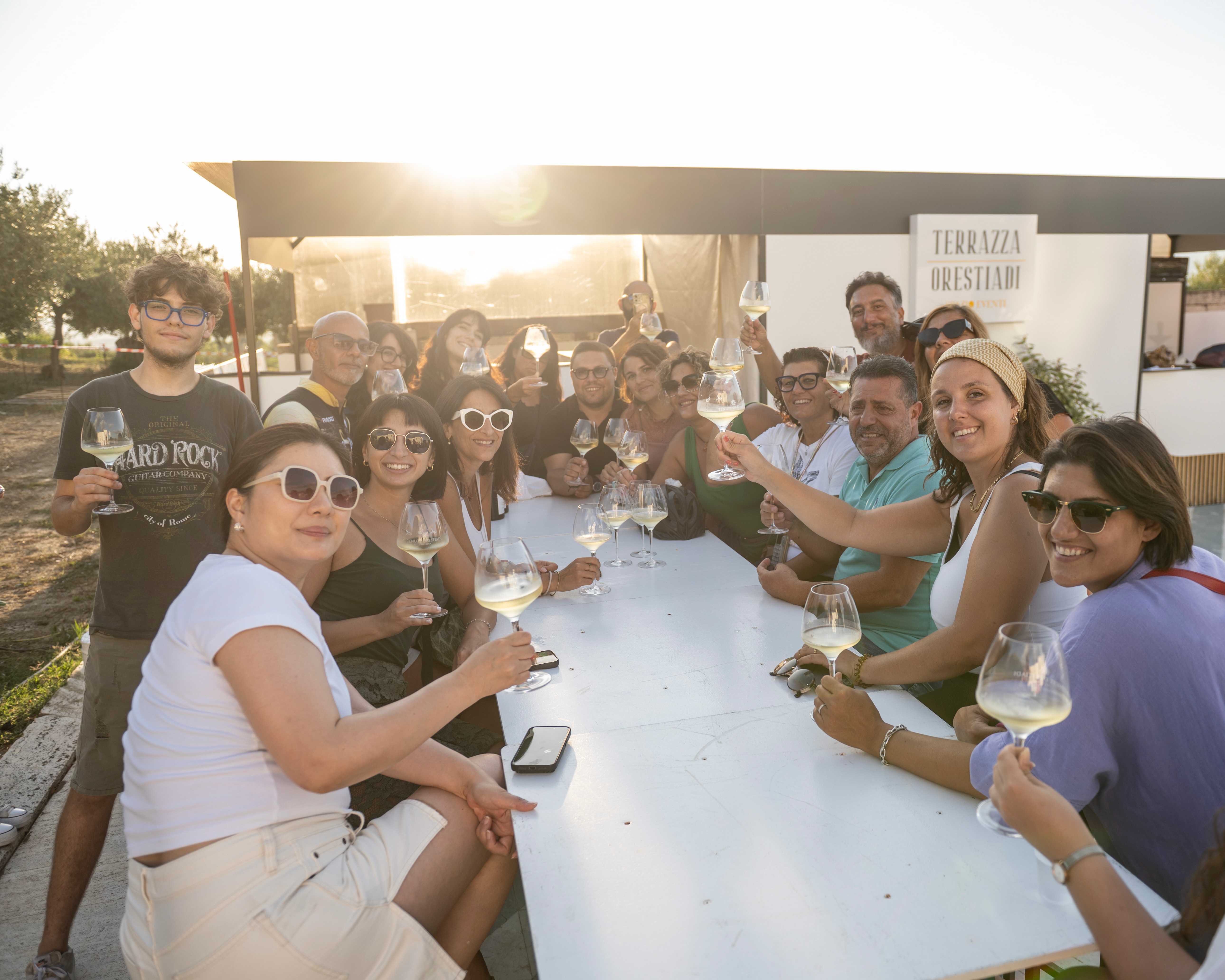 Group toasting at Terrazza Orestiadi