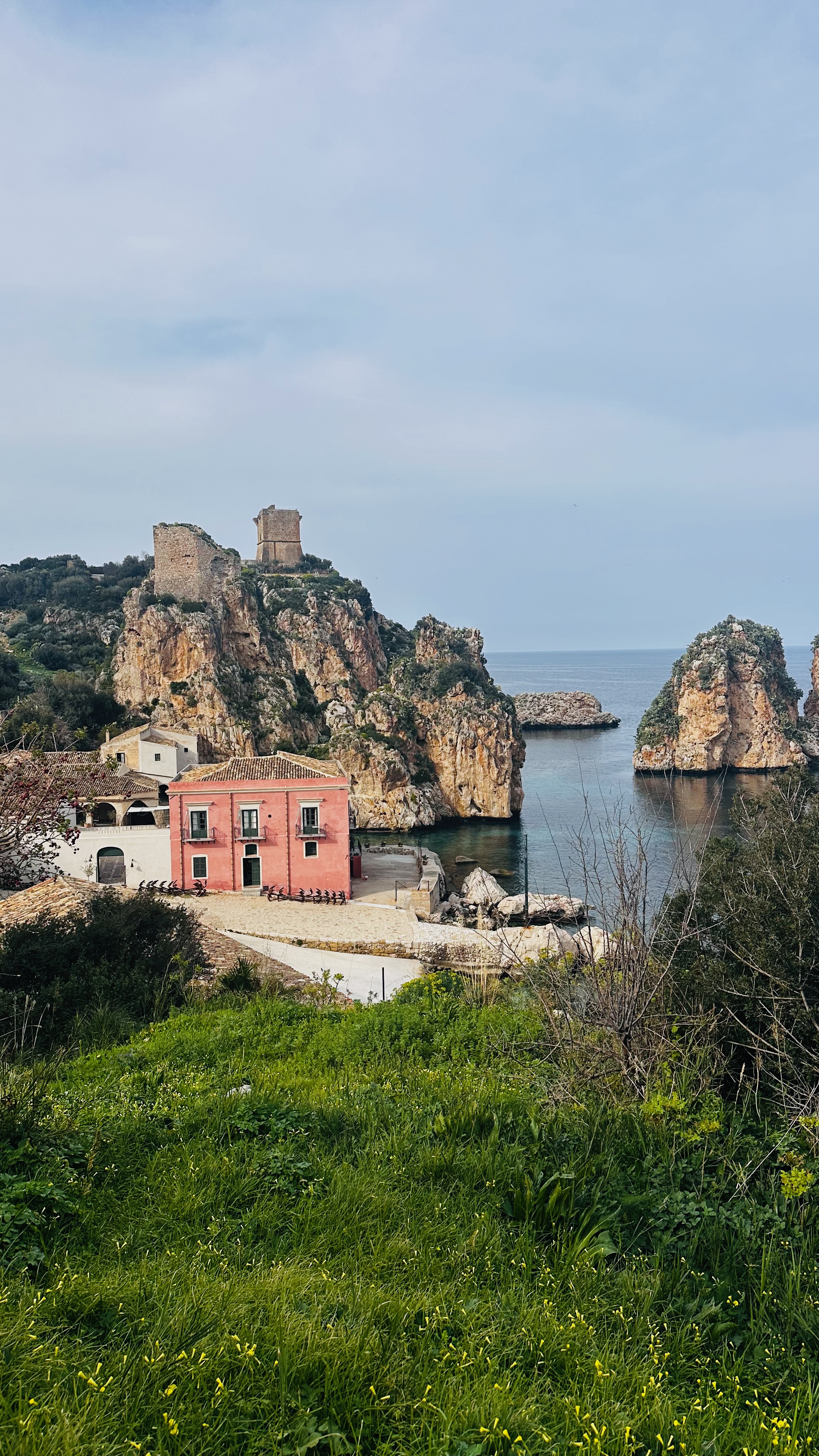 Turquoise Sicilian sea and cliffs